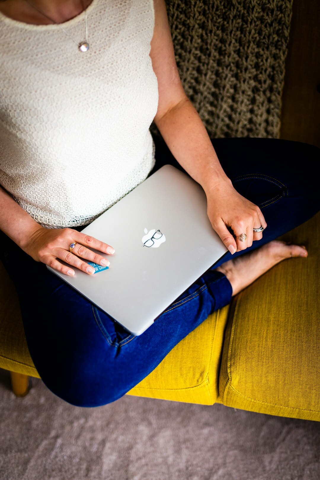 Person working on a laptop reviewing content
